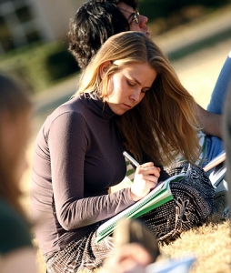 A college girl studying outside