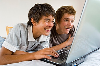 teenage boys surfing the internet